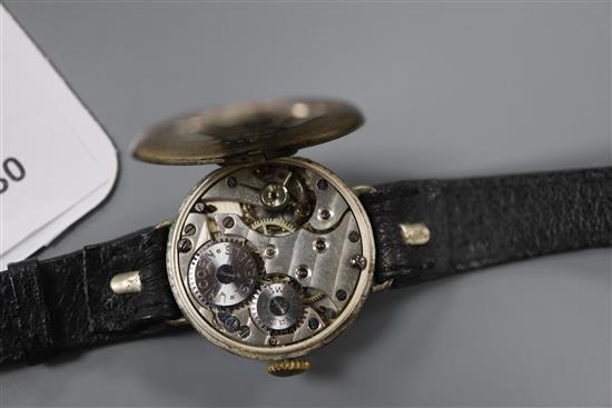 A gentlemans late 1930s silver Rolex Unicorn manual wind wrist watch, on associated leather strap.